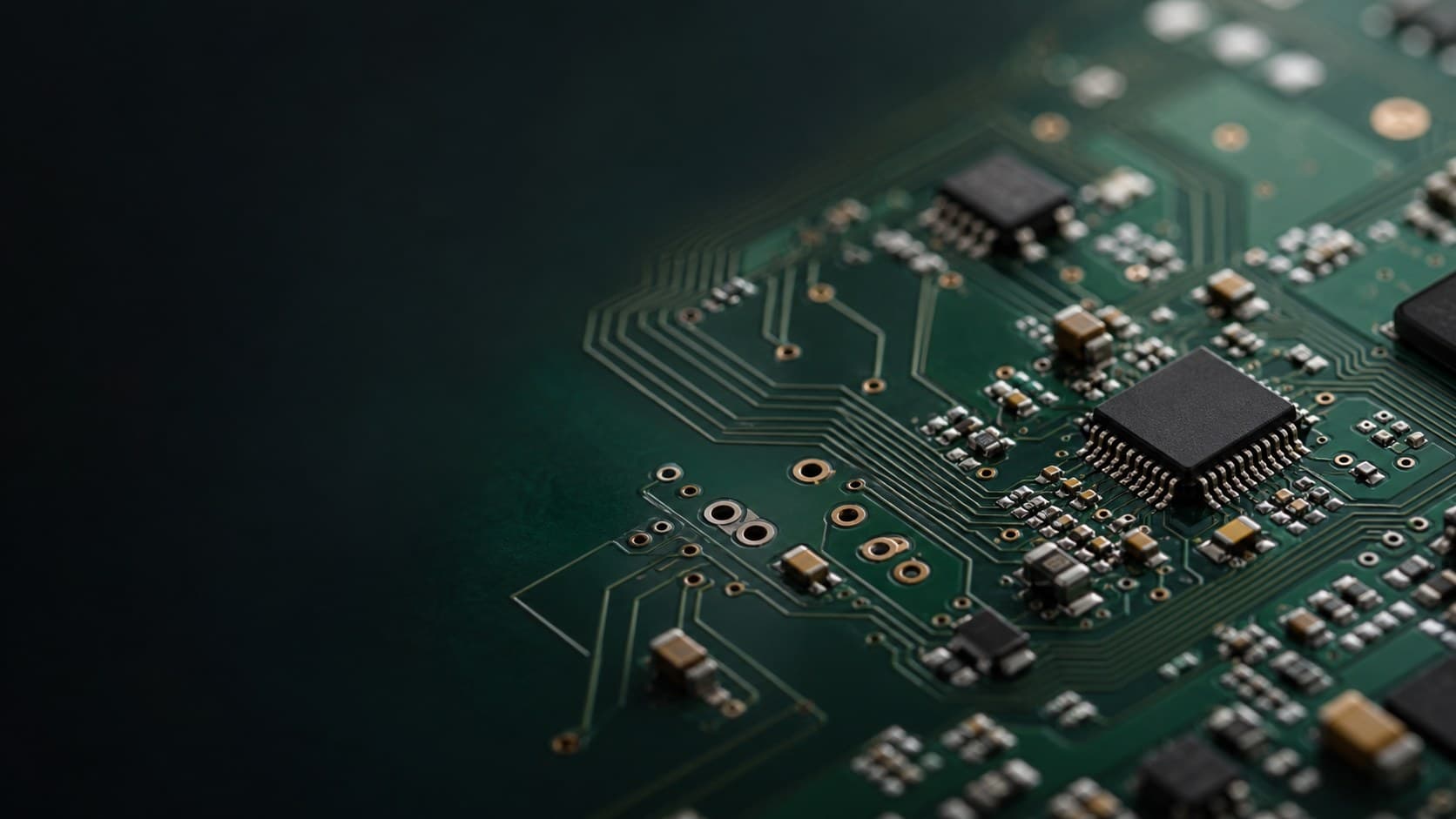 Macro photograph of a PCB with traces, vias, and mounted components